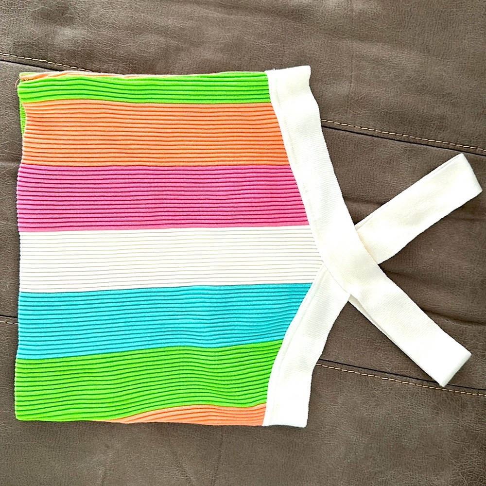 NWT from a local boutique. Size M/L, I’m a M and it fit perfect. Very cute on!